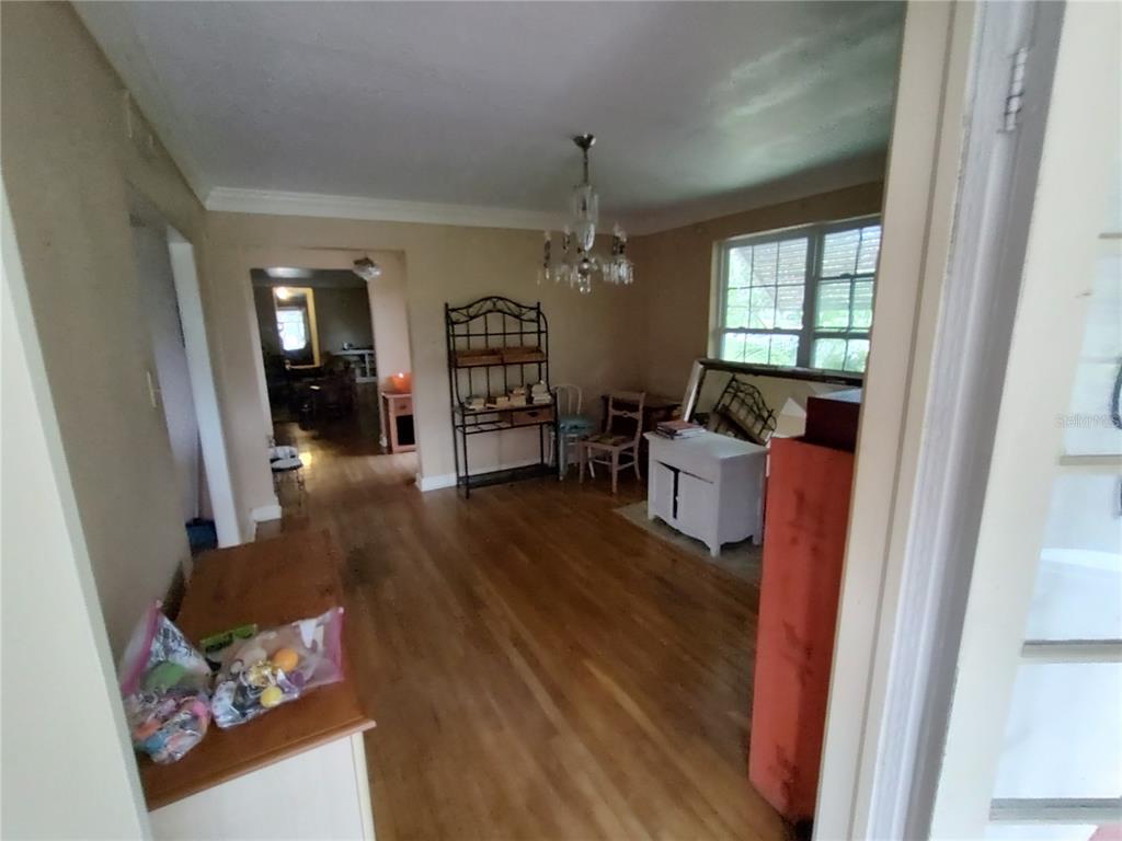 995 West 11th Avenue Mount Dora, FL 32757 - Photo 17 of 49 a living room with furniture and a window