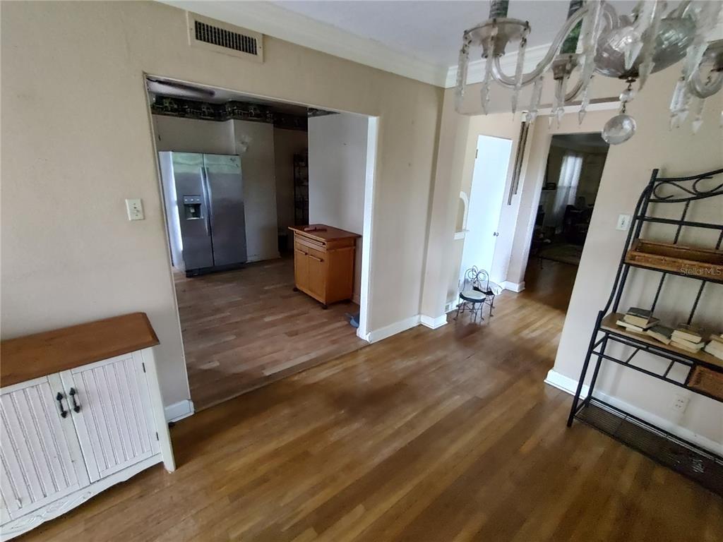 995 West 11th Avenue Mount Dora, FL 32757 - Photo 18 of 49 wooden floor with windows and fireplace