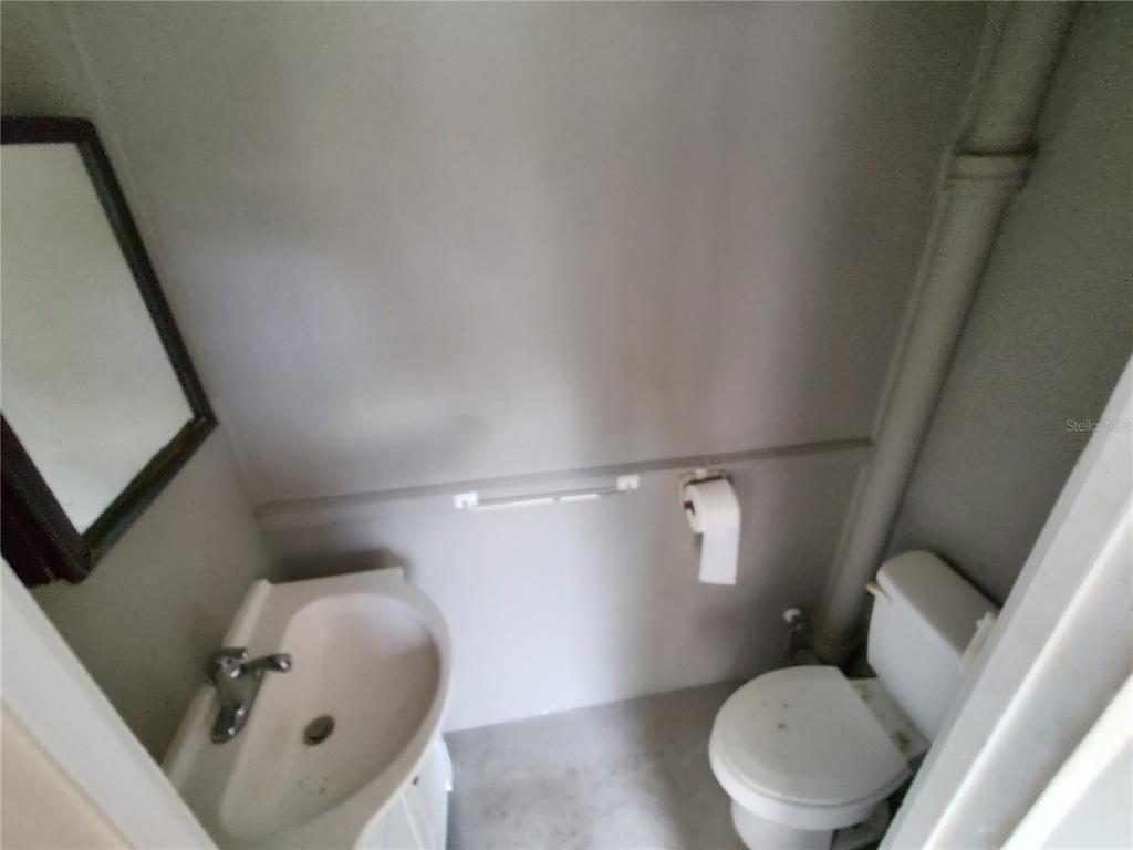 995 West 11th Avenue Mount Dora, FL 32757 - Photo 37 of 49 a bathroom with a toilet and a shower