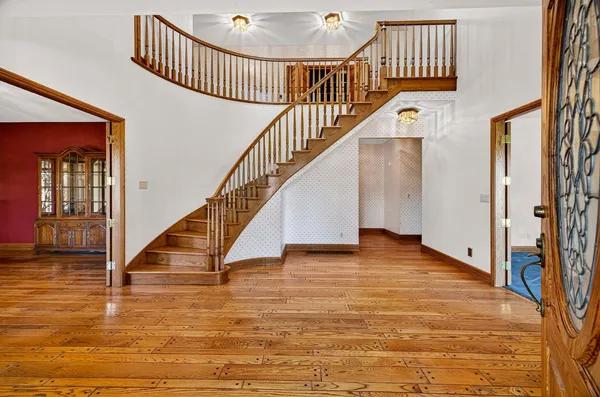 a kitchen with granite countertop cabinets stainless steel appliances and a counter space
