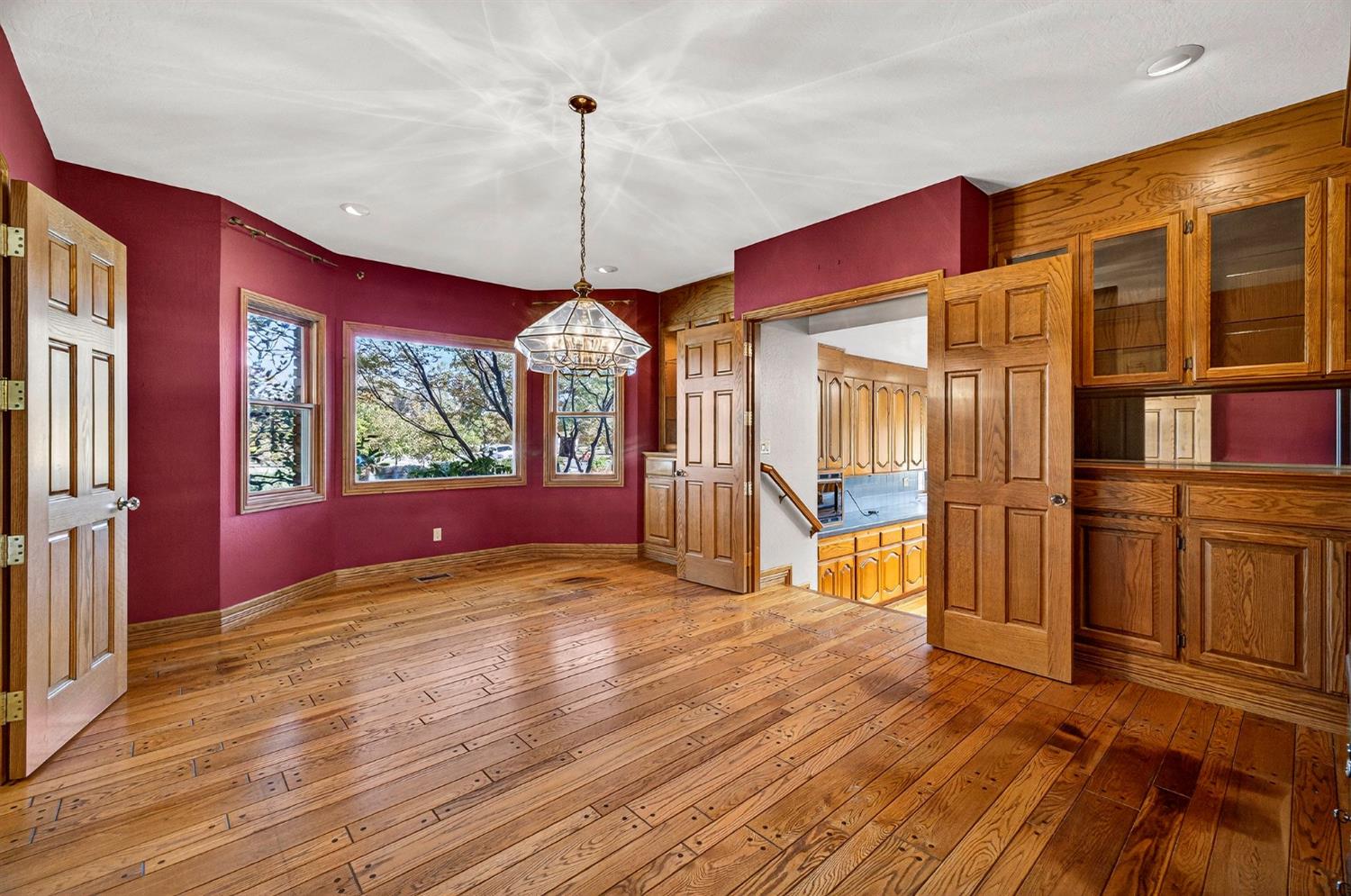 8970 South Butte Road Sutter, CA 95982 - Photo 18 of 86 a view of an empty room with a window and wooden floor