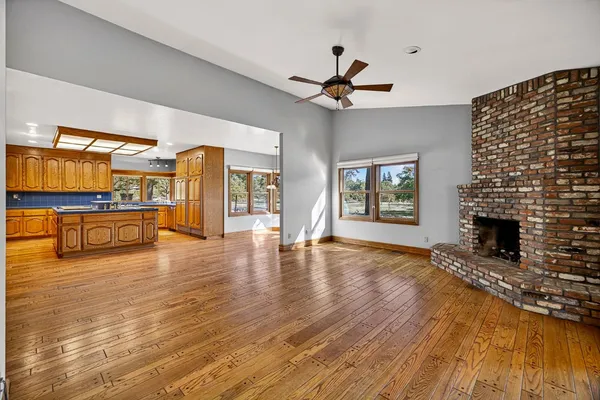 a bathroom with a sink a mirror and a shower