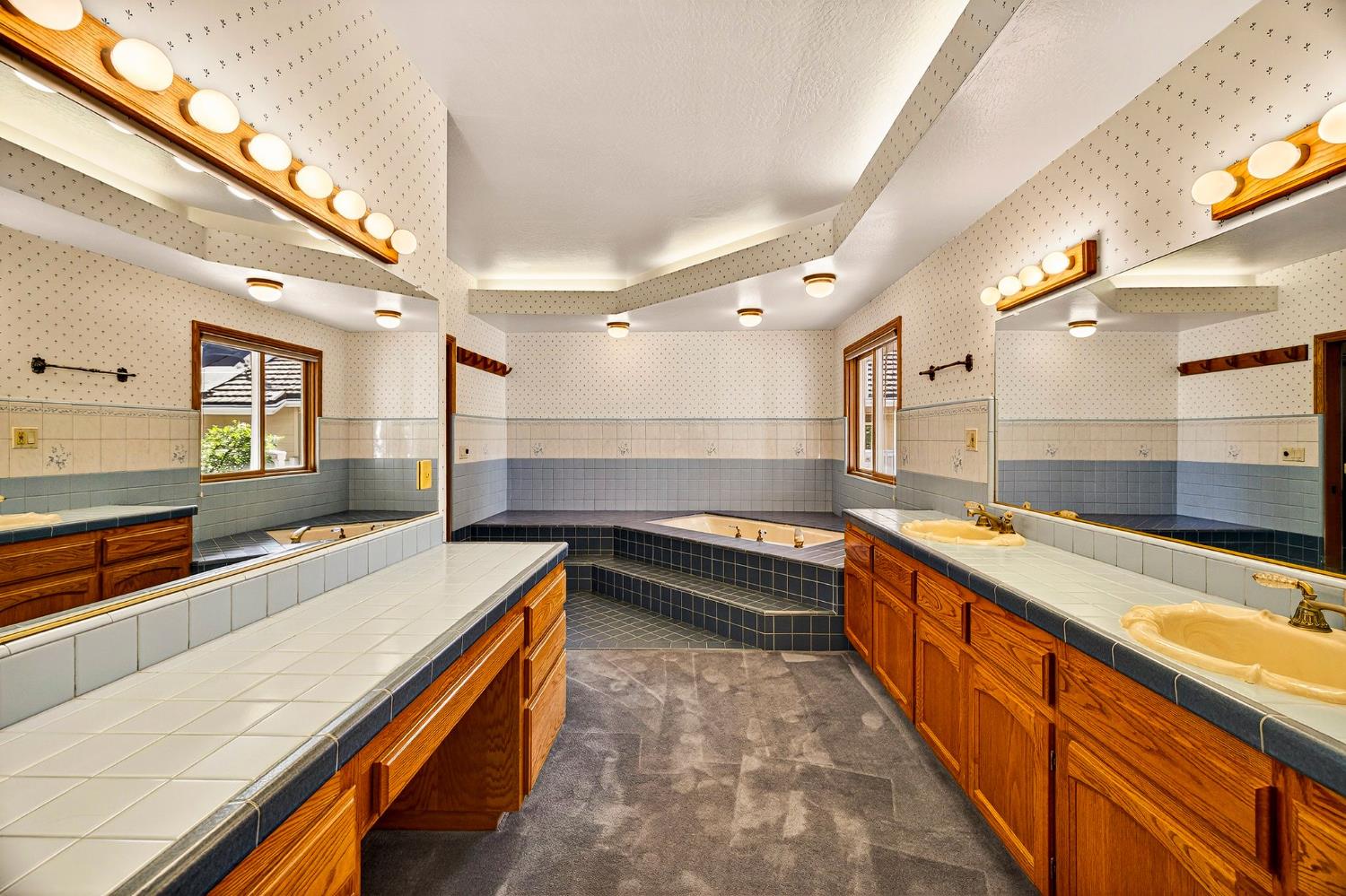 8970 South Butte Road Sutter, CA 95982 - Photo 36 of 86 a large kitchen with stainless steel appliances a large counter top and a sink