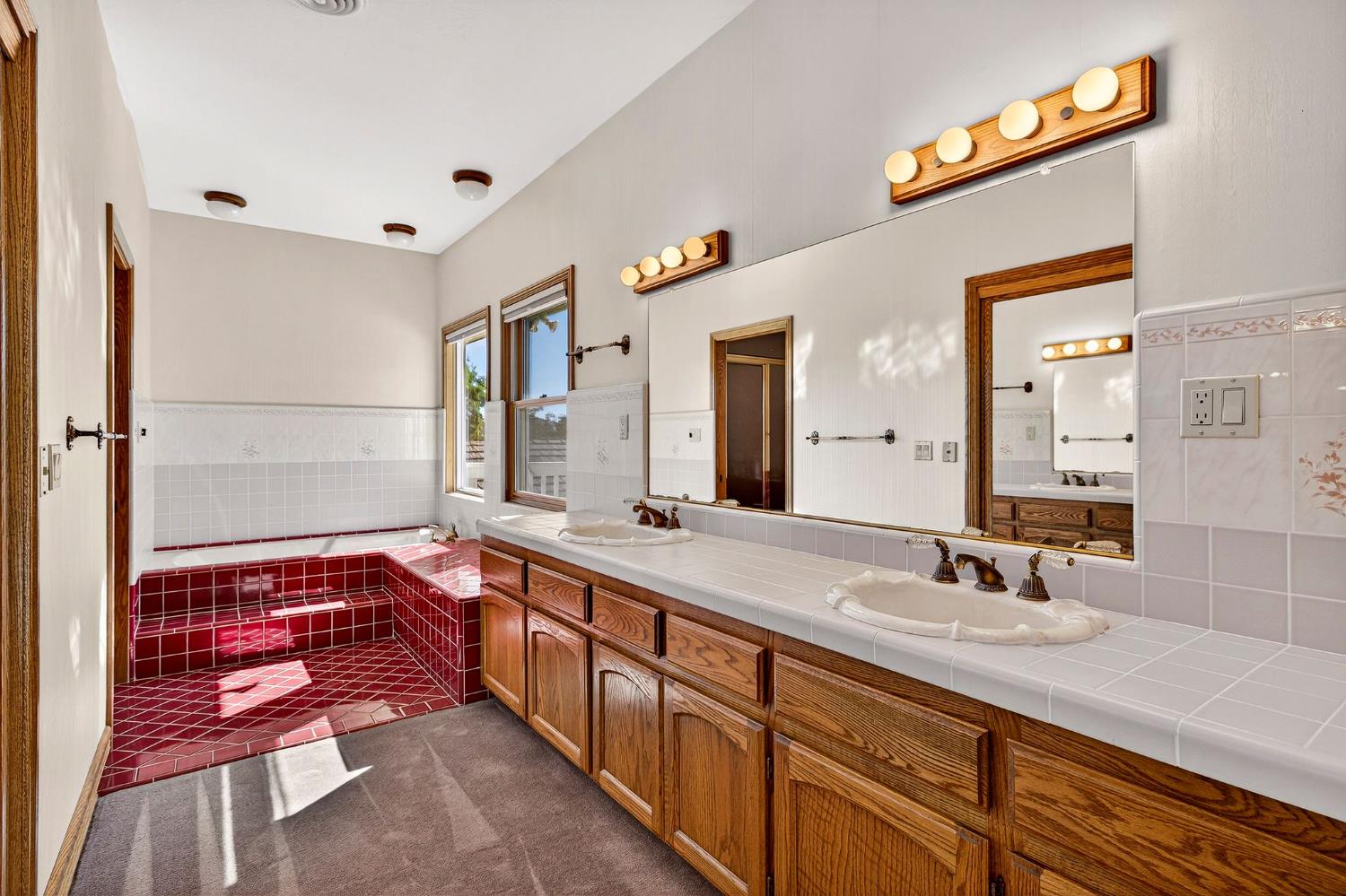8970 South Butte Road Sutter, CA 95982 - Photo 46 of 86 a bathroom with a sink and a bathtub