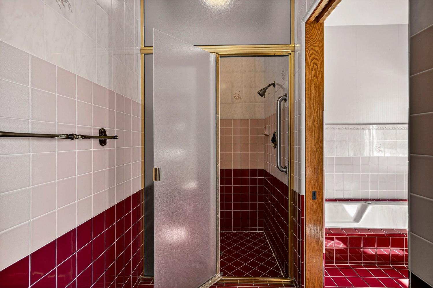 8970 South Butte Road Sutter, CA 95982 - Photo 48 of 86 a bathroom with a glass door shower