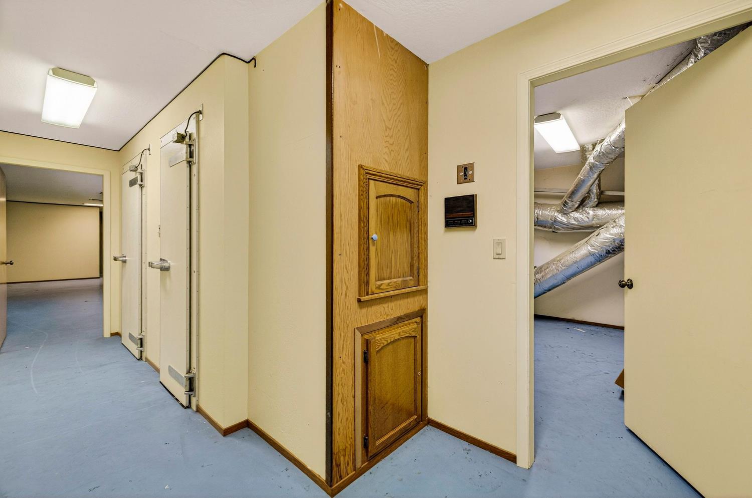 8970 South Butte Road Sutter, CA 95982 - Photo 56 of 86 a view of a hallway with wooden floor