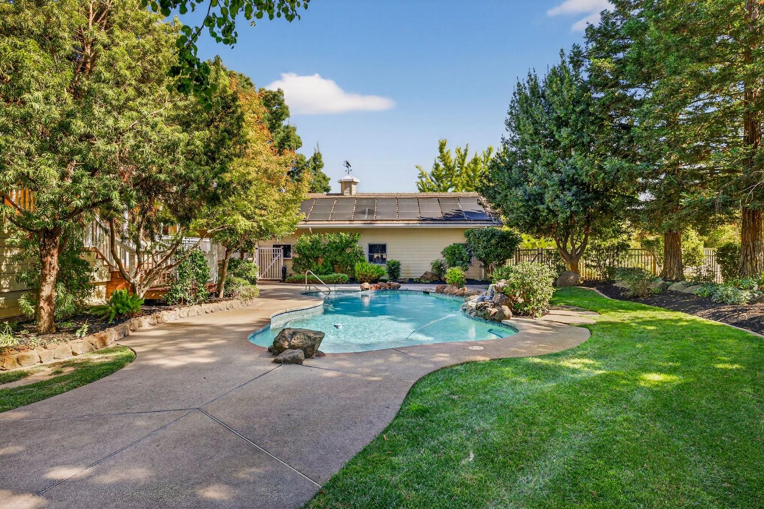 8970 South Butte Road Sutter, CA 95982 - Photo 68 of 86 a view of a park with plants and a bench