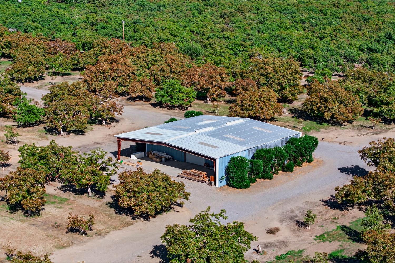 8970 South Butte Road Sutter, CA 95982 - Photo 78 of 86 an aerial view of a house with a yard and greenery space