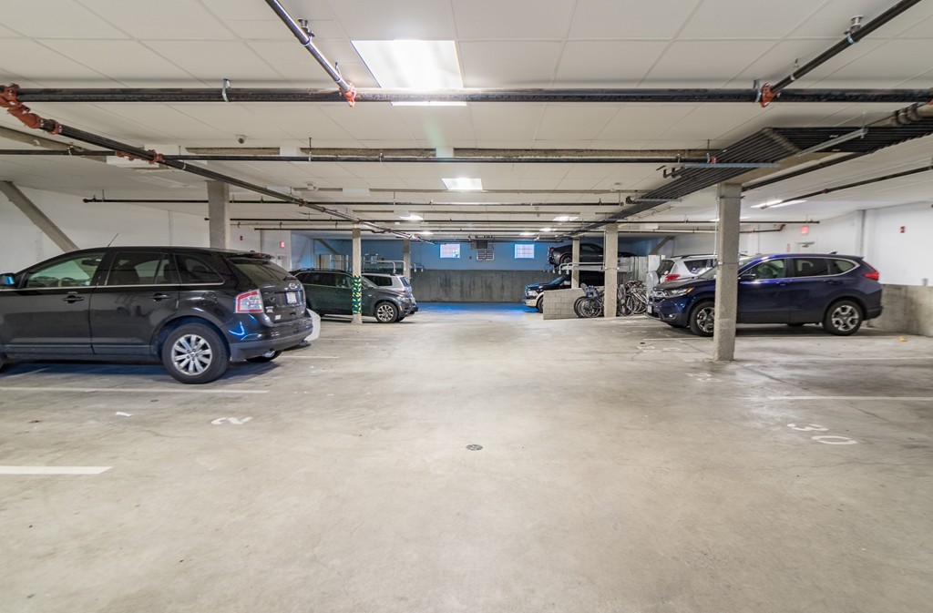 463 Rutherford Avenue, Unit 305 Boston, MA 02129 - Photo 17 of 19 a view of a cars parking