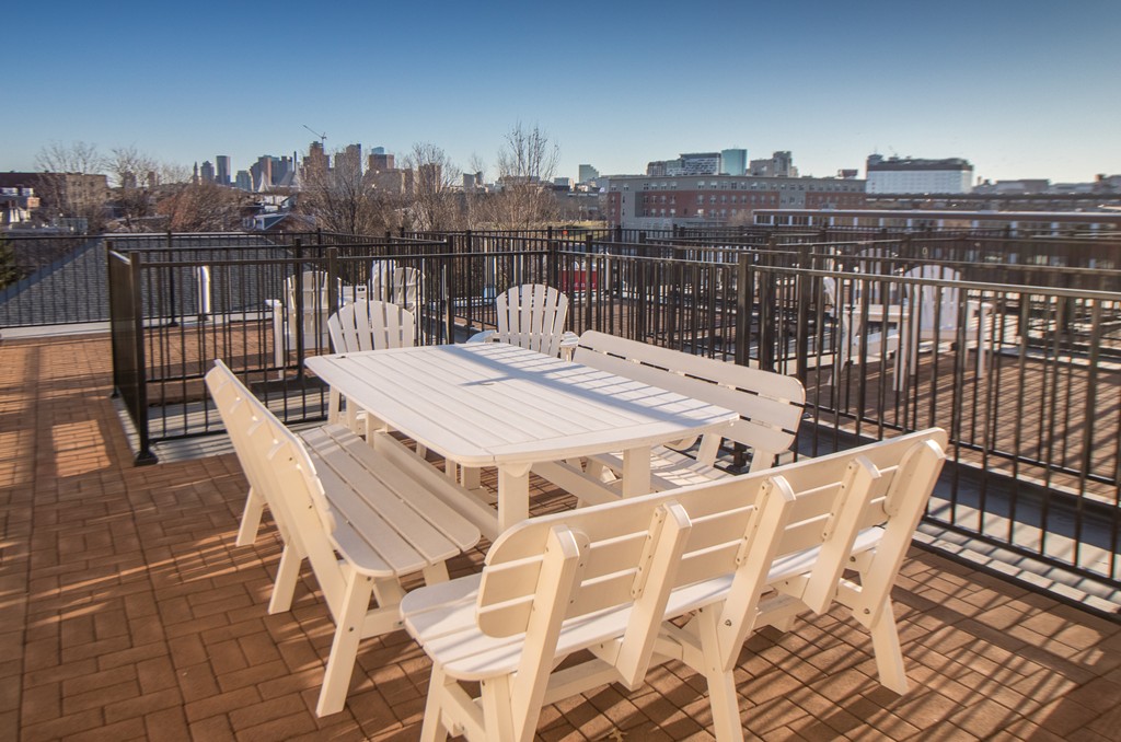 463 Rutherford Avenue, Unit 305 Boston, MA 02129 - Photo 18 of 19 a view of a terrace with sitting area