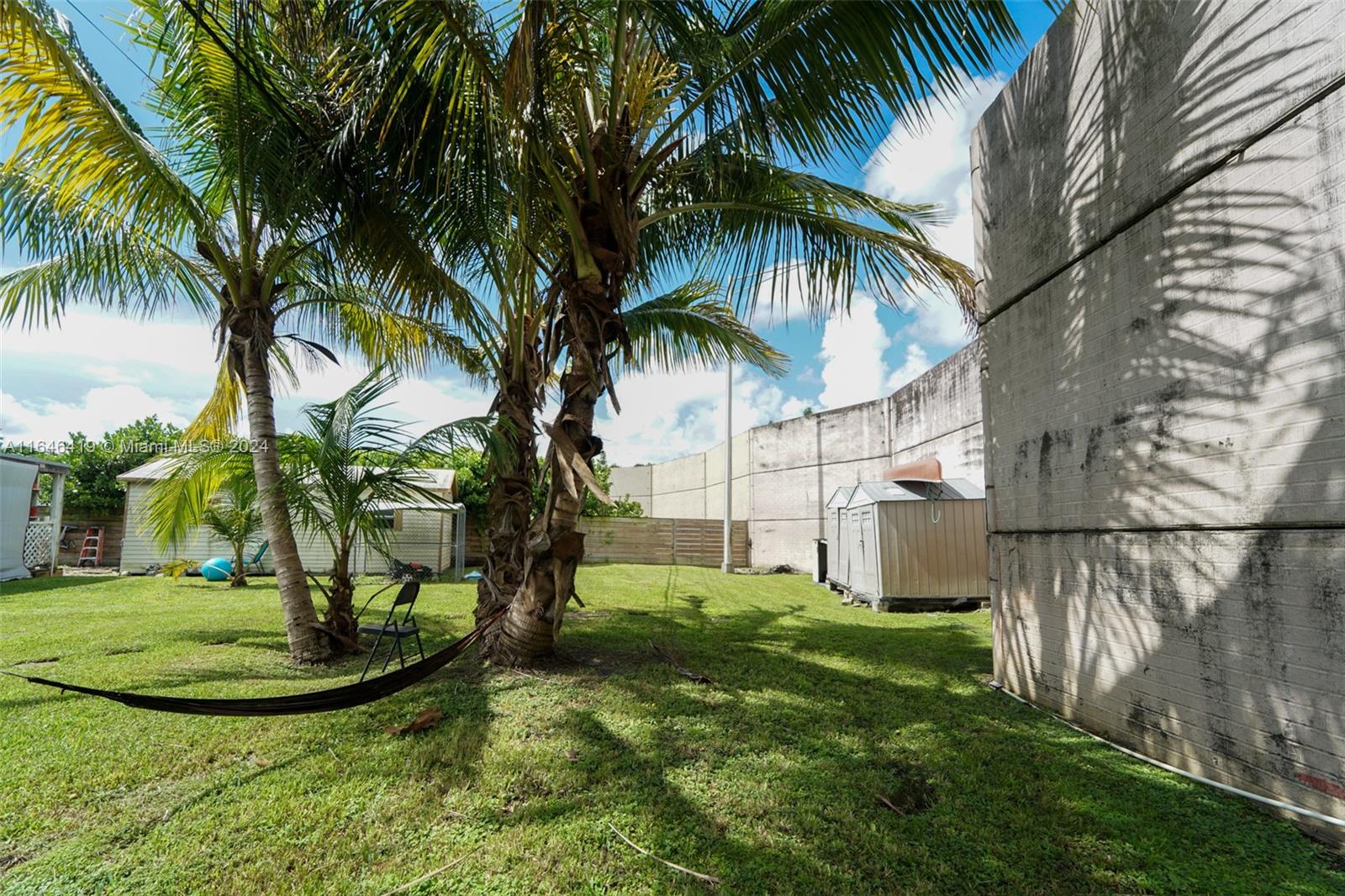 18400 Northeast 7th Court North Miami Beach, FL 33179 - Photo 21 of 24 a view of a backyard