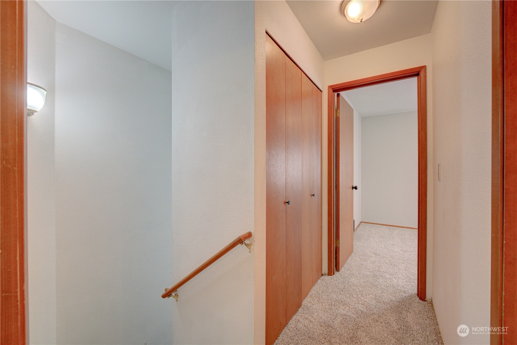 18910 Bothell Everett Highway, Unit J3 Bothell, WA 98012 - Photo 22 of 33 a view of a hallway