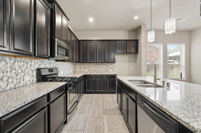 $420,000 | 6318 Wolf Run Drive, Katy, TX 77493