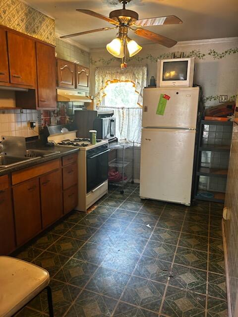 286 Tompkins Street Gary, IN 46406 - Photo 8 of 9 a kitchen with storage and utility