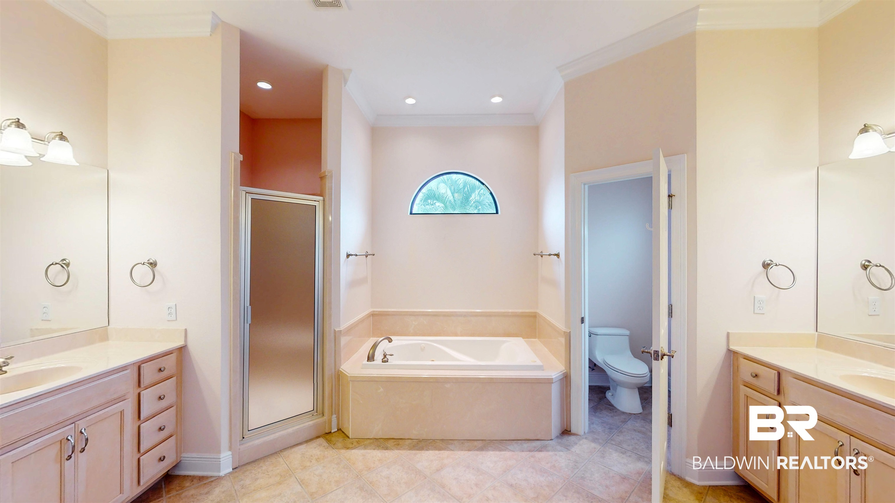 214 Hemingway Loop Foley, AL 36535 - Photo 25 of 67 Bathroom featuring two vanities, a stall shower, ornamental molding, a garden tub, and recessed lighting