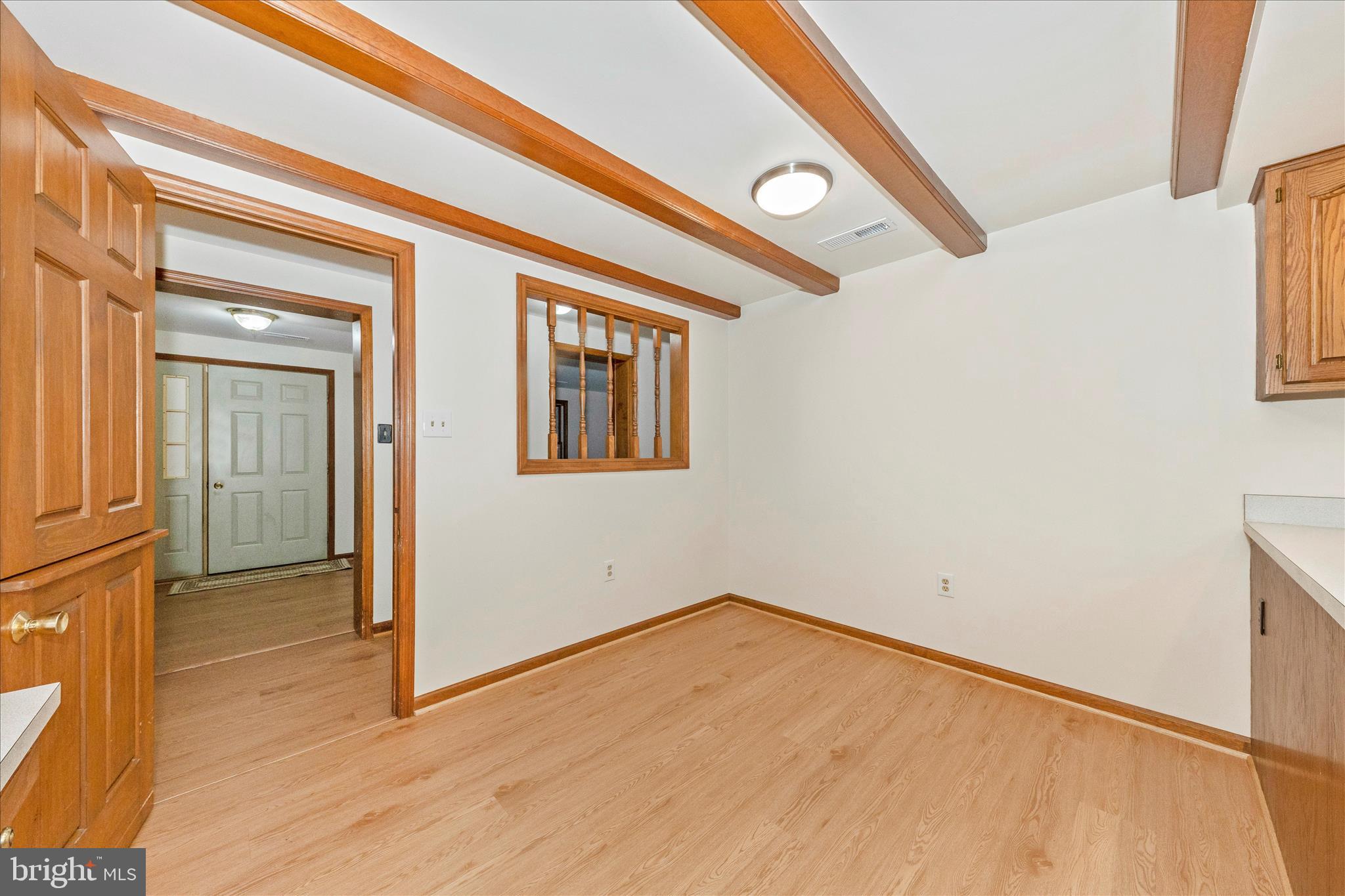 24607 Hells Delight Road Smithsburg, MD 21783 - Photo 16 of 47 a view of empty room with wooden floor