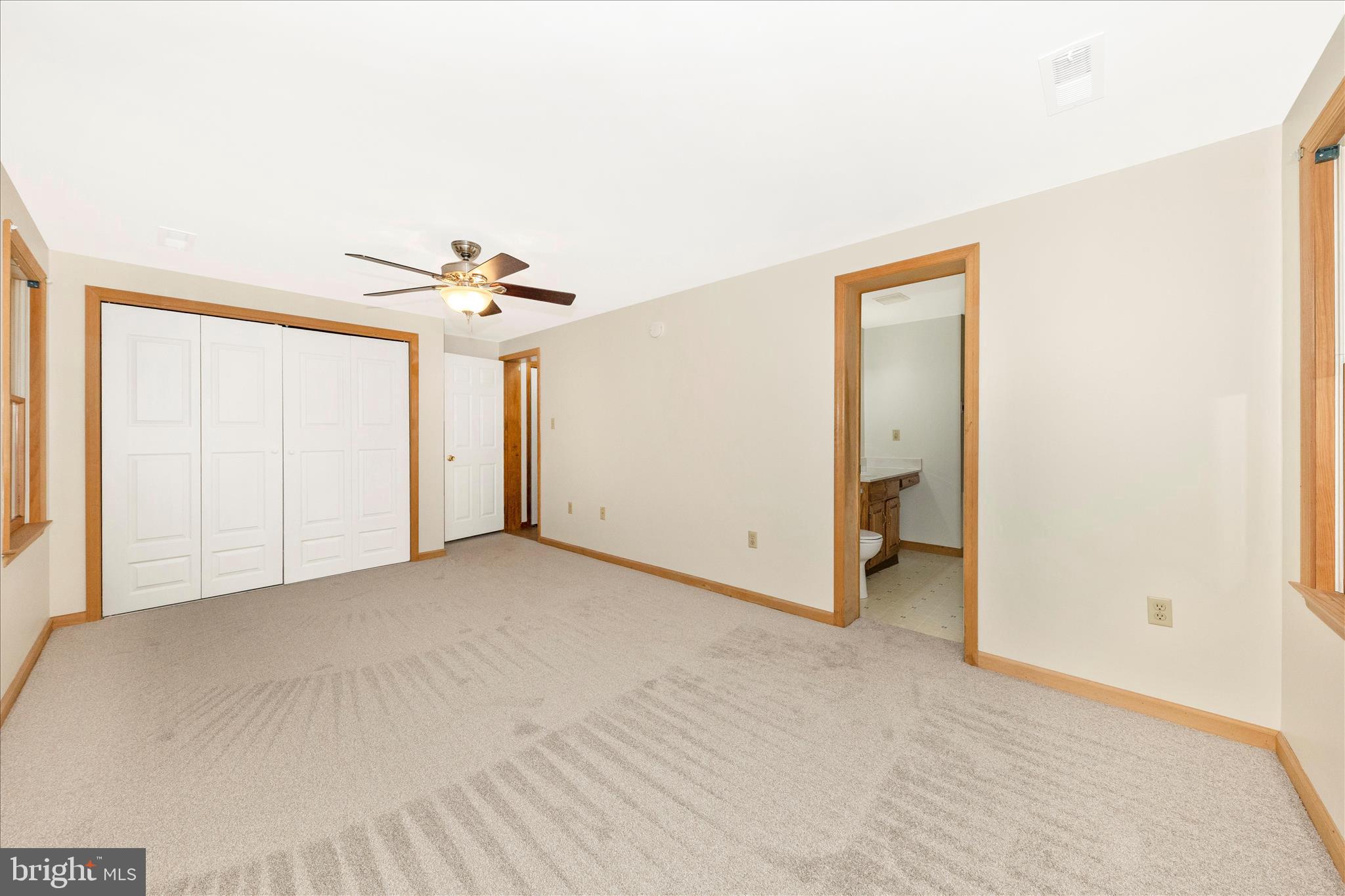 24607 Hells Delight Road Smithsburg, MD 21783 - Photo 21 of 47 a view of a room with a ceiling fan