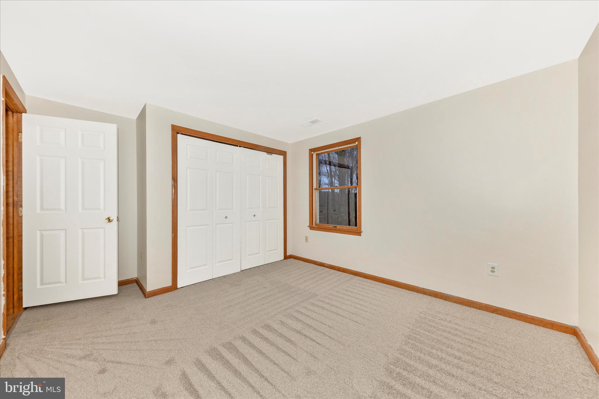 24607 Hells Delight Road Smithsburg, MD 21783 - Photo 29 of 47 an empty room with windows