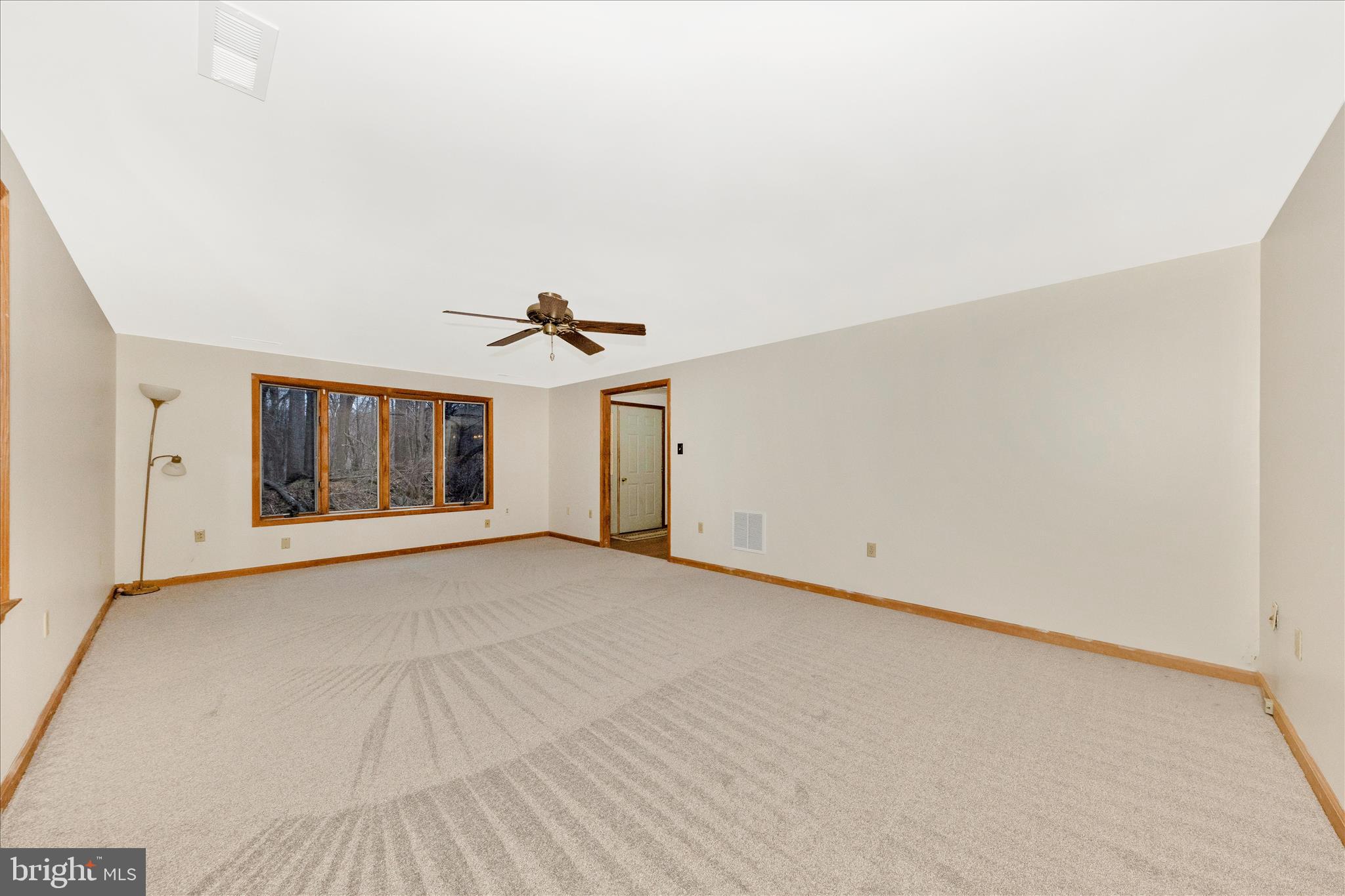 24607 Hells Delight Road Smithsburg, MD 21783 - Photo 5 of 47 an empty room with windows