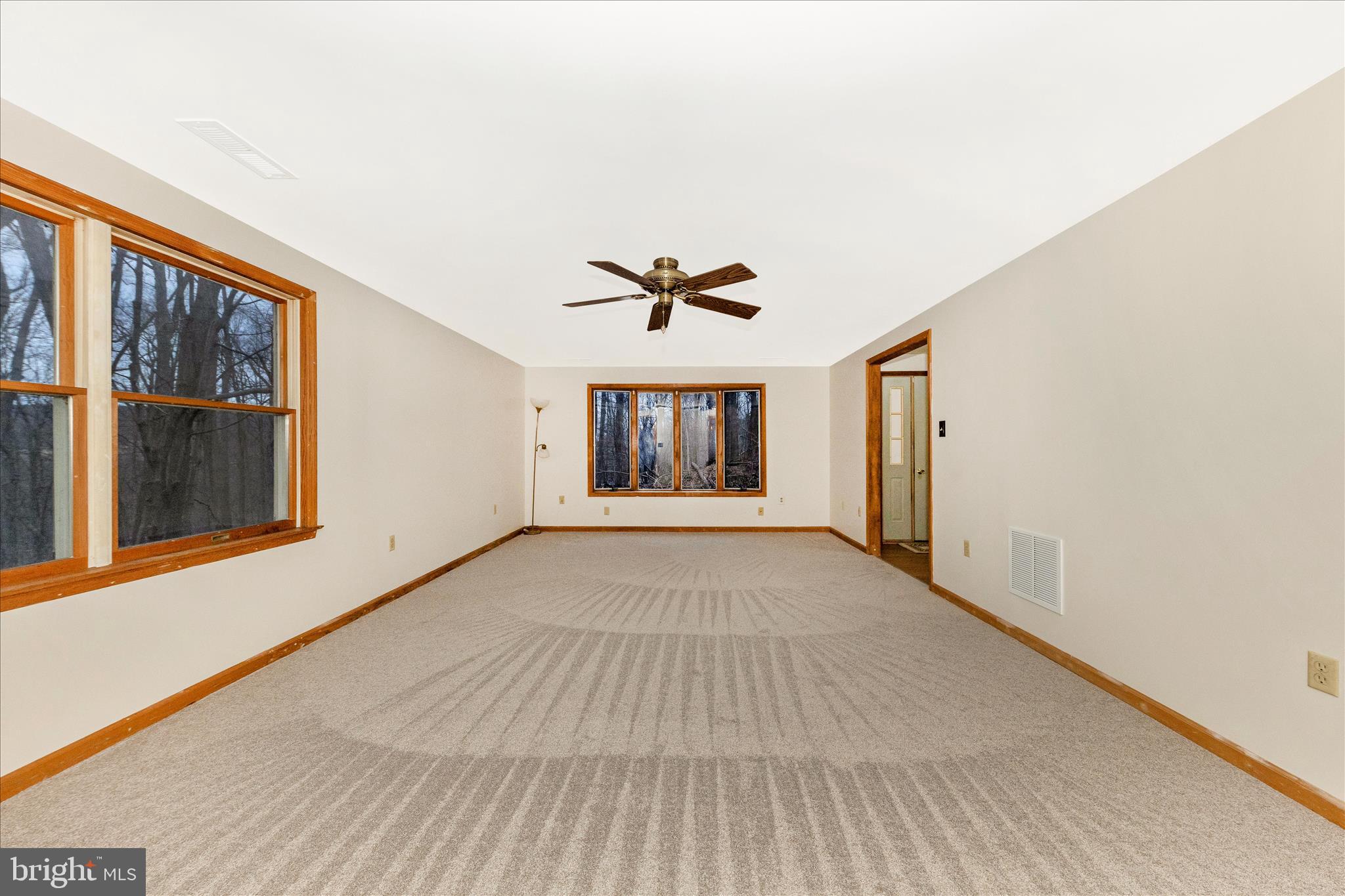 24607 Hells Delight Road Smithsburg, MD 21783 - Photo 6 of 47 a view of an empty room with a window
