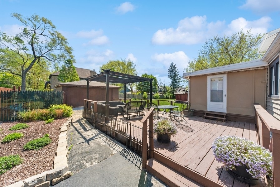 605 Revere Road Glenview, IL 60025 - Photo 13 of 18 a view of a patio with couches table and chairs and potted plants