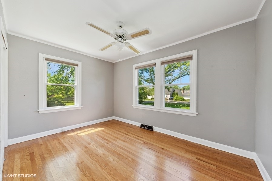 605 Revere Road Glenview, IL 60025 - Photo 10 of 18 a view of an empty room with a window