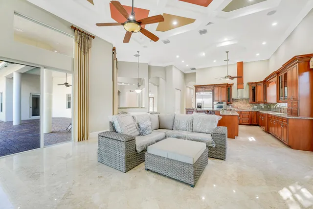 a view of a room with wooden floor and window