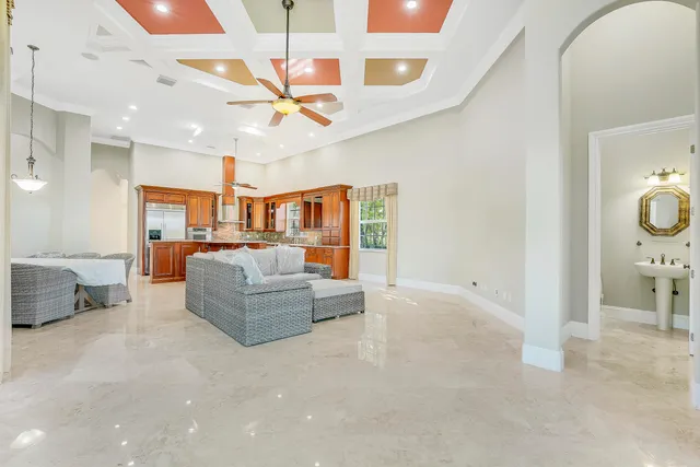 a spacious bathroom with sink and mirror