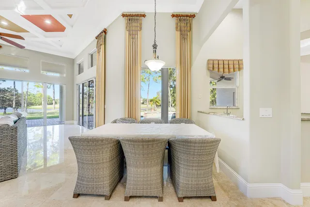 a spacious bathroom with a tub a double vanity sink a mirror a window and a shower