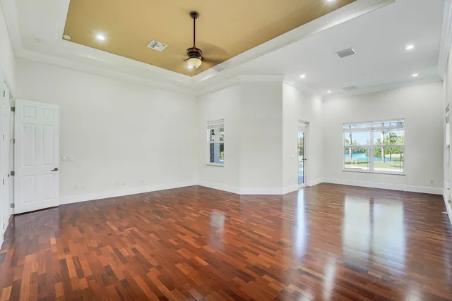 a bathroom with a toilet a sink and a mirror