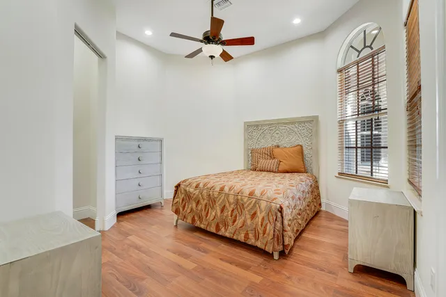 a view of a swimming pool and deck