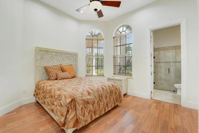 a view of a house with a swimming pool and porch