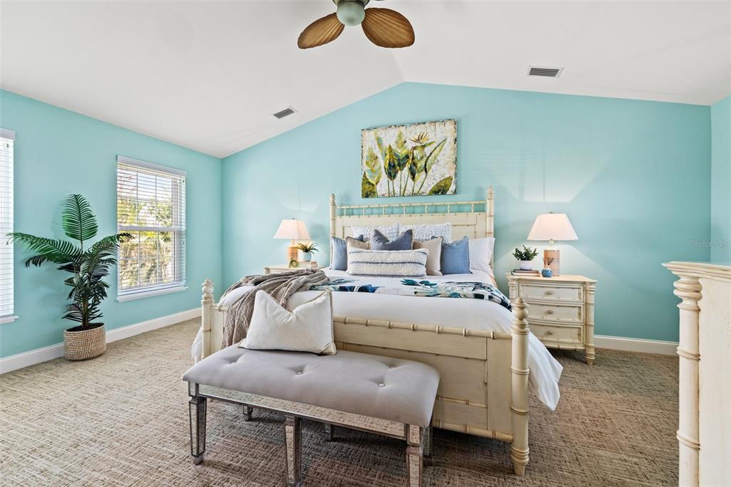 511 Windward Passage Clearwater Beach, FL 33767 - Photo 23 of 40 a bed room with furniture and a window