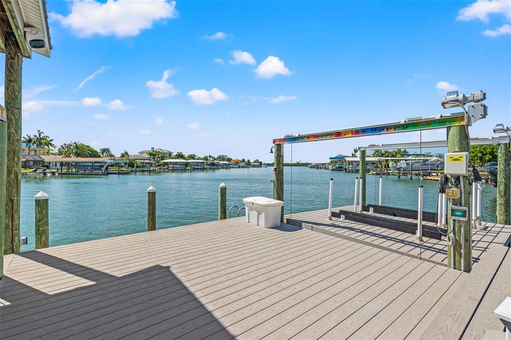511 Windward Passage Clearwater Beach, FL 33767 - Photo 38 of 40 a view of a lake with sitting area