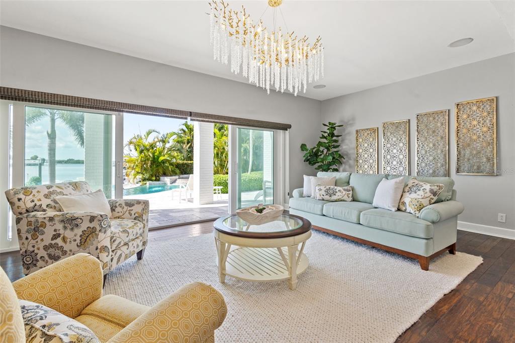 511 Windward Passage Clearwater Beach, FL 33767 - Photo 6 of 40 a living room with furniture and a large window