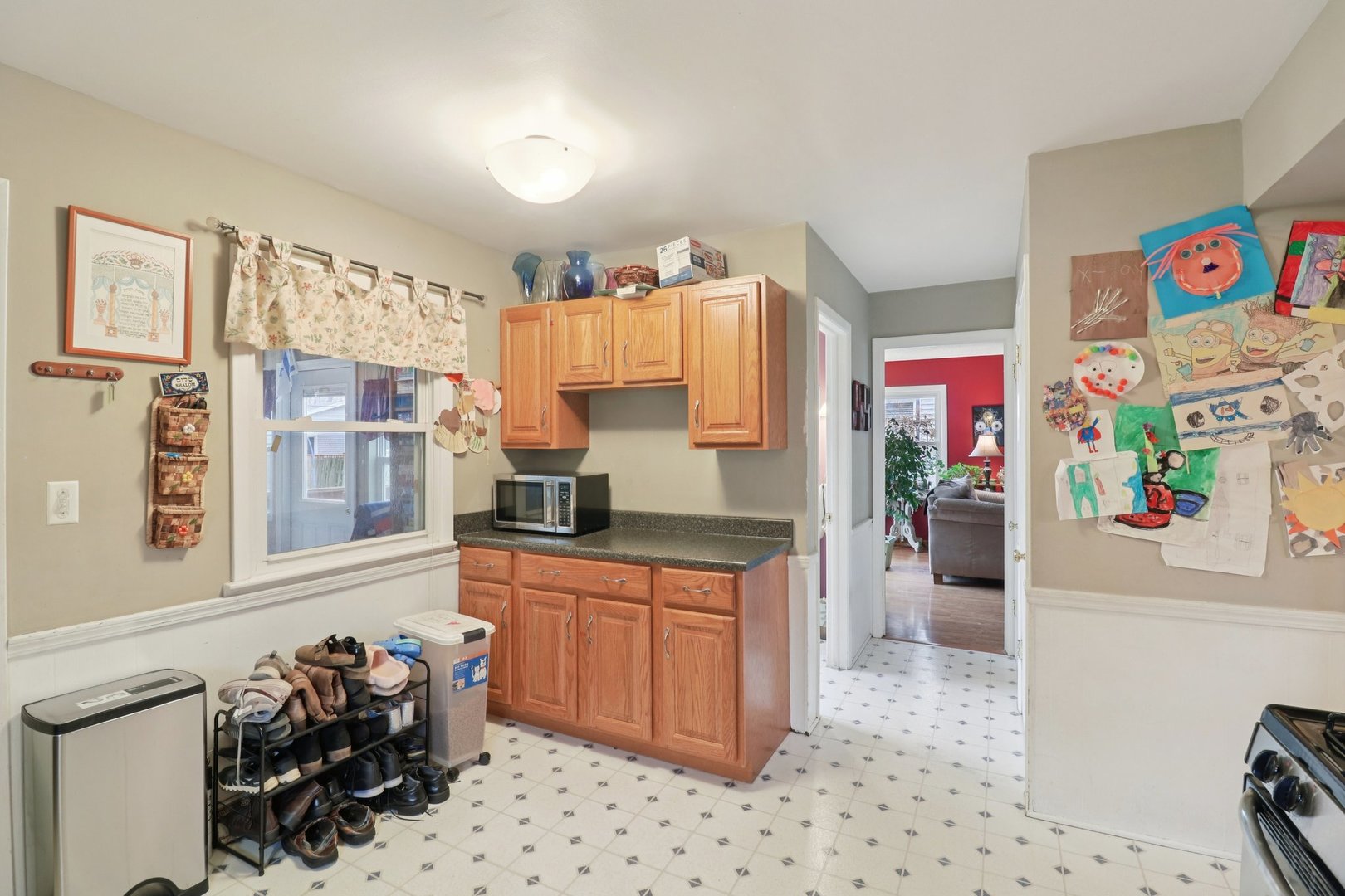 610 Maple Drive Buffalo Grove, IL 60089 - Photo 13 of 39 a kitchen with a sink and cabinets