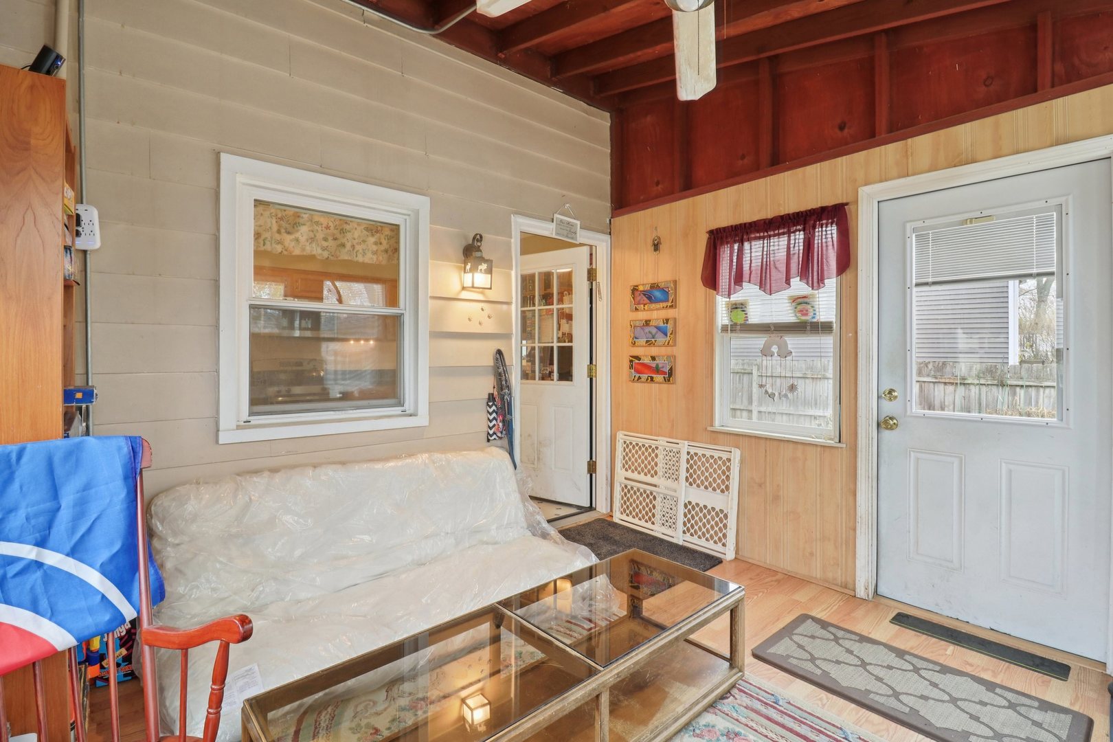610 Maple Drive Buffalo Grove, IL 60089 - Photo 16 of 39 a living room with furniture a window and a wooden floor