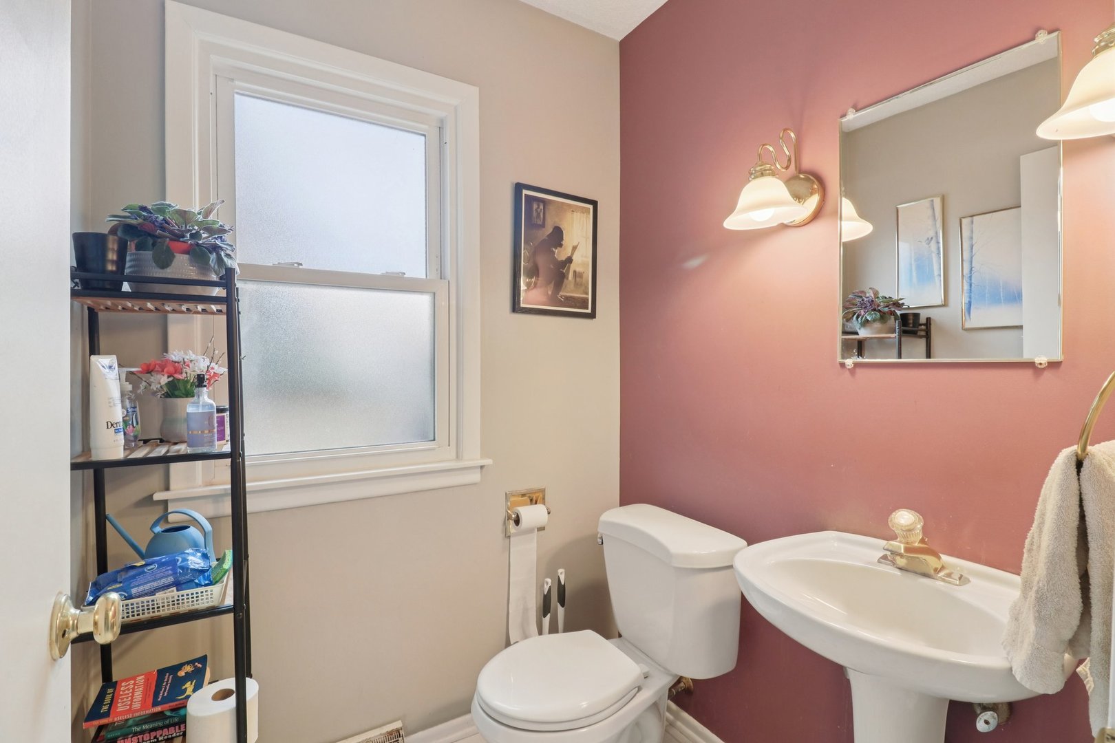 610 Maple Drive Buffalo Grove, IL 60089 - Photo 17 of 39 a bathroom with a sink vanity mirror and toilet