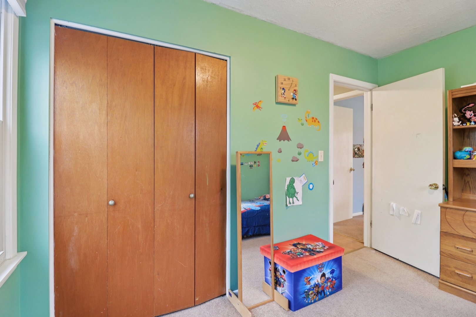 610 Maple Drive Buffalo Grove, IL 60089 - Photo 24 of 39 a living room with white walls and furniture