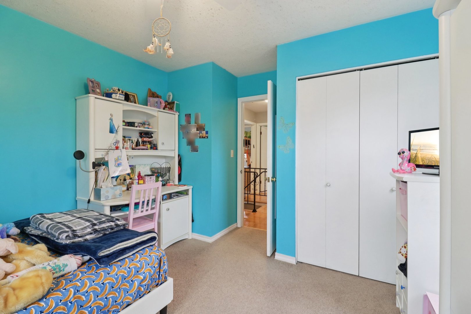 610 Maple Drive Buffalo Grove, IL 60089 - Photo 26 of 39 a bedroom with a bed and cabinets