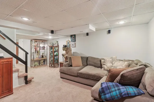 a view of a room with furniture and toys