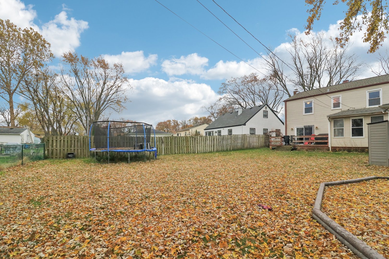 610 Maple Drive Buffalo Grove, IL 60089 - Photo 38 of 39 a view of a house with a yard