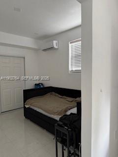 Miramar Tropical Miramar, FL 33023 - Photo 5 of 6 a bedroom with a bed and a window