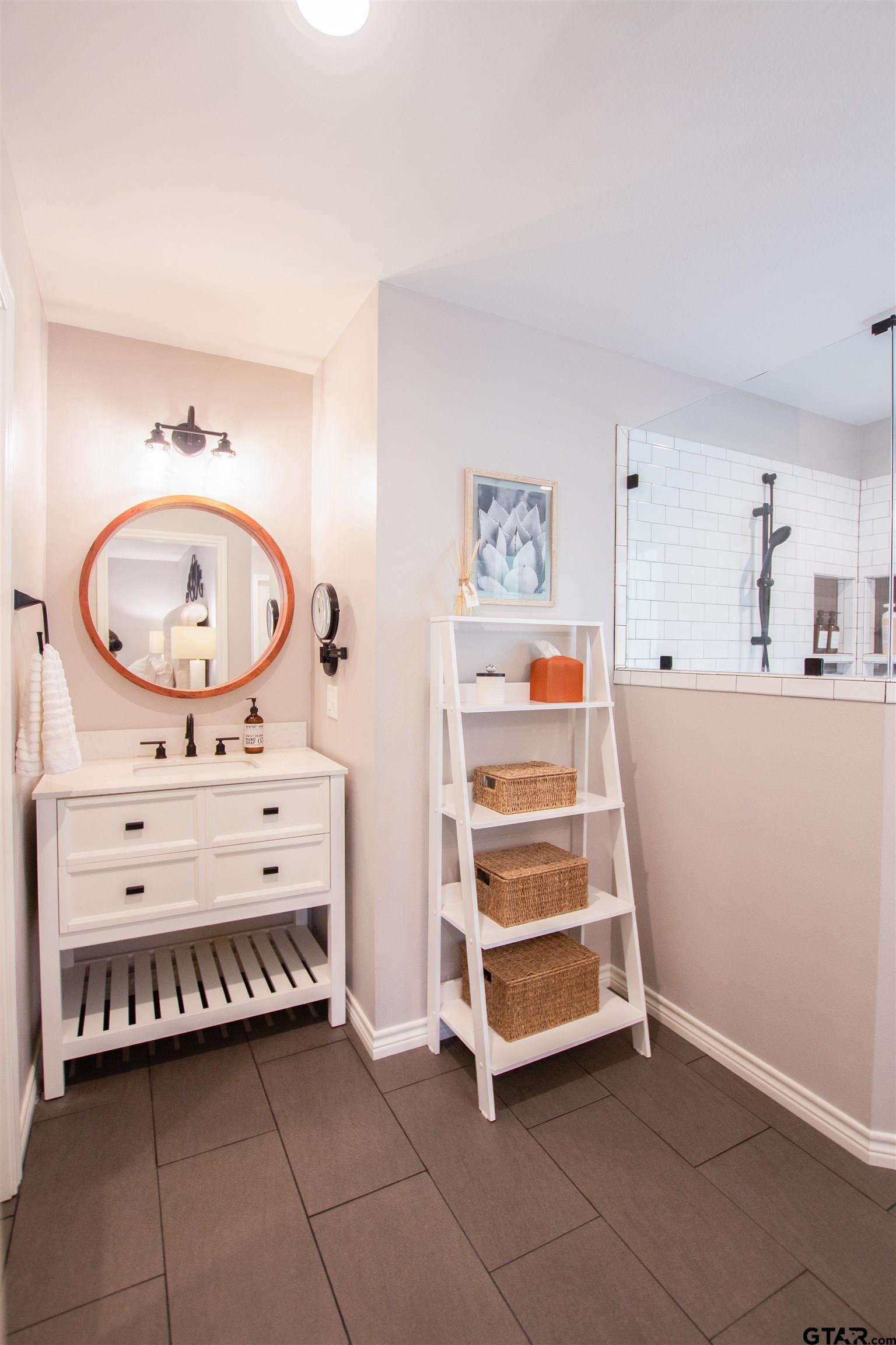 2618 Prestwick Road Jacksonville, TX 75766 - Photo 30 of 38 a view of a bedroom with baby crib and dresser