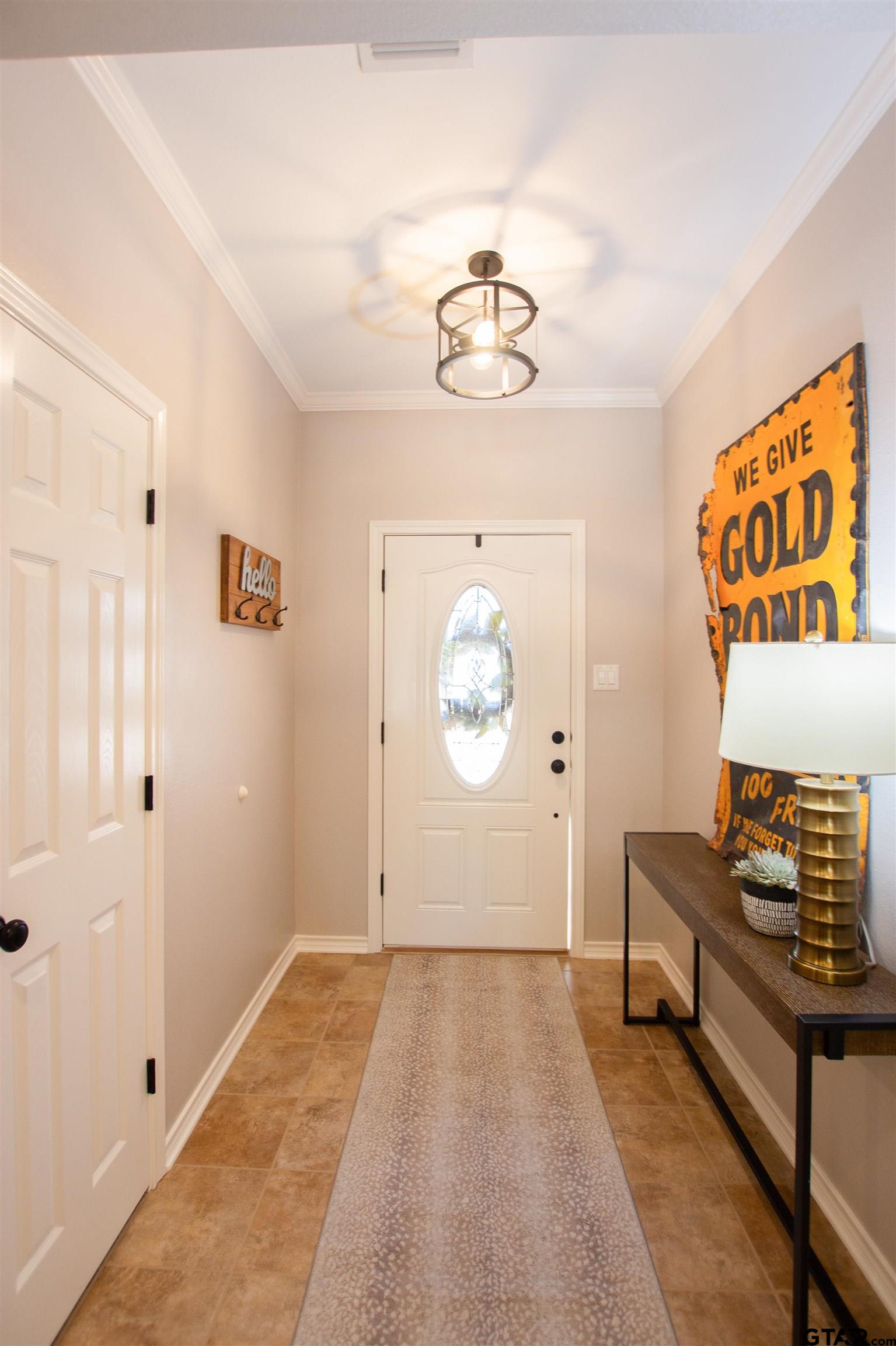 2618 Prestwick Road Jacksonville, TX 75766 - Photo 3 of 38 wooden floor with windows and closet