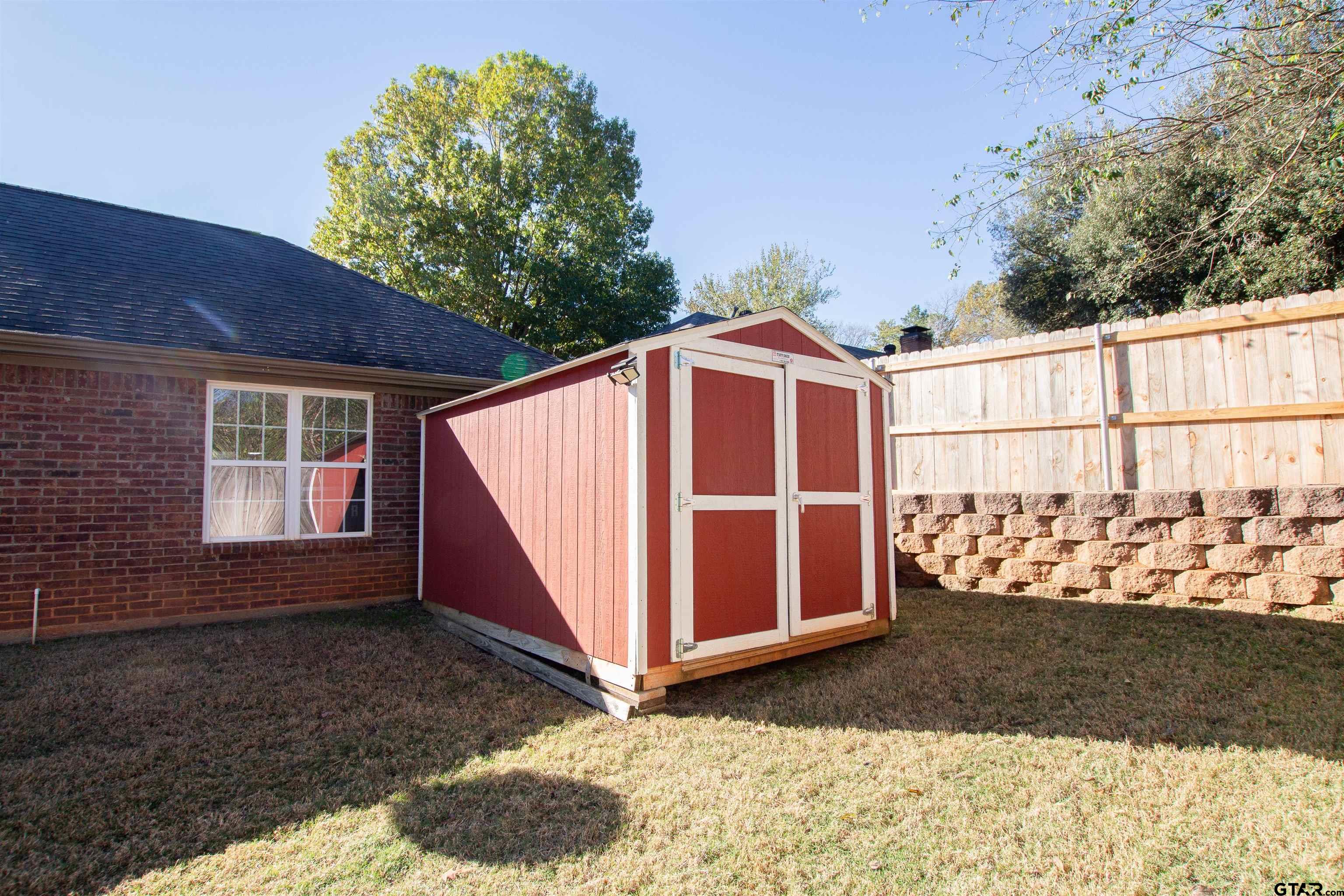 2618 Prestwick Road Jacksonville, TX 75766 - Photo 38 of 38 a view of a house with a garage