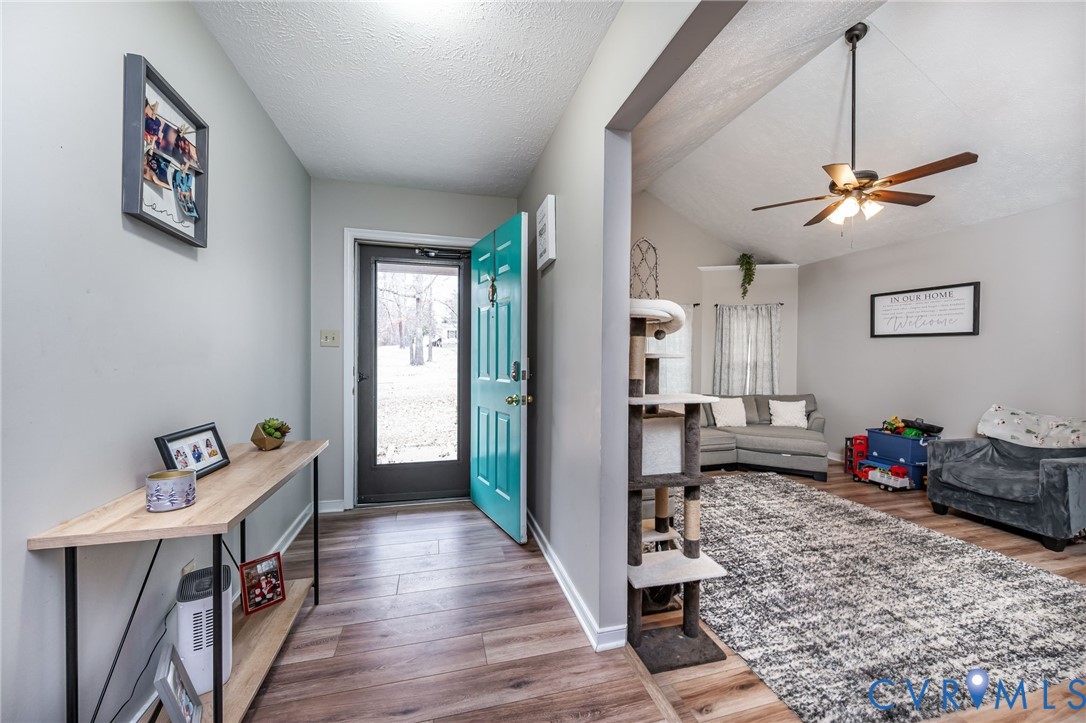 12190 Pinyon Lane Ruther Glen, VA 22546 - Photo 11 of 36 a view of a hallway with a livingroom