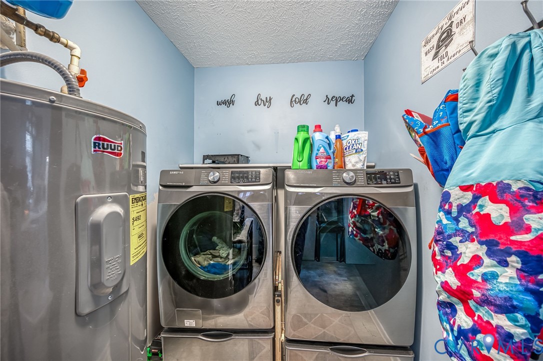 12190 Pinyon Lane Ruther Glen, VA 22546 - Photo 20 of 36 a utility room with dryer and washer