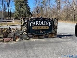 12190 Pinyon Lane Ruther Glen, VA 22546 - Photo 9 of 36 a sign that is on a brick wall