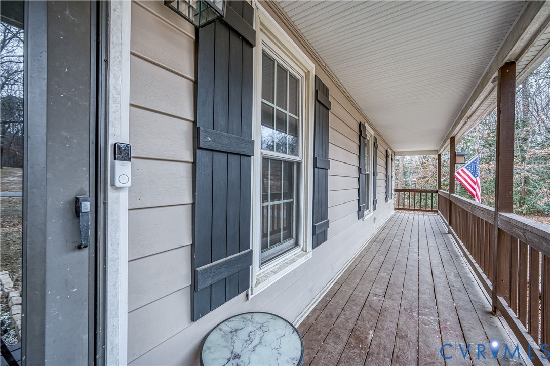 12190 Pinyon Lane Ruther Glen, VA 22546 - Photo 10 of 36 a view of balcony with wooden floor